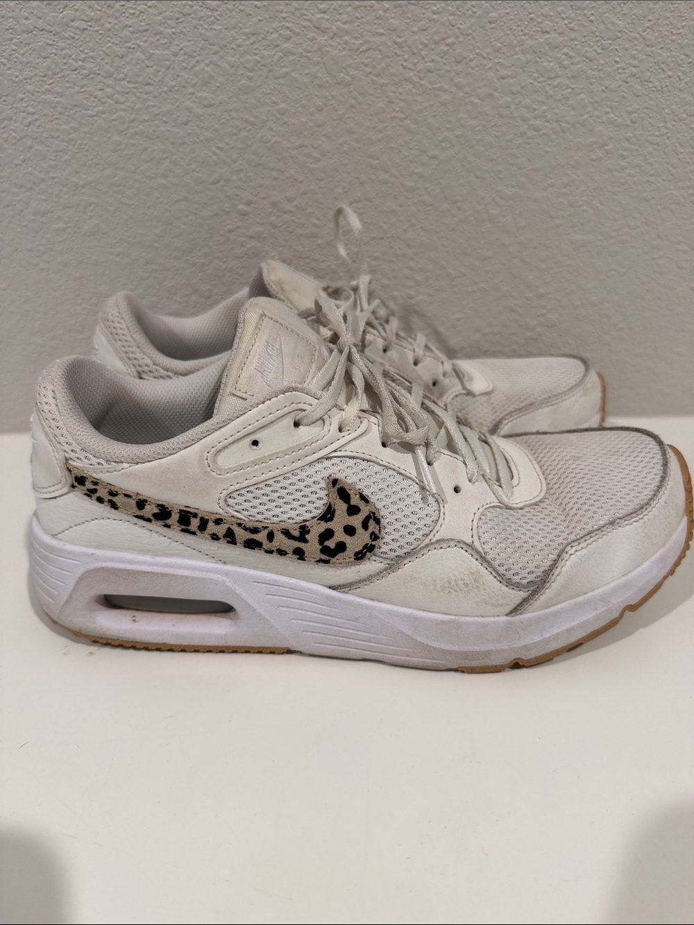 Nike Women's White Sneakers with Leopard Print Swoosh